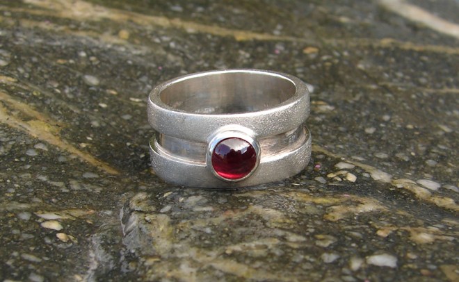 'Crimson Tide - Frosted Stirling Silver Ring with Garnet' by artist Marley McKinnie